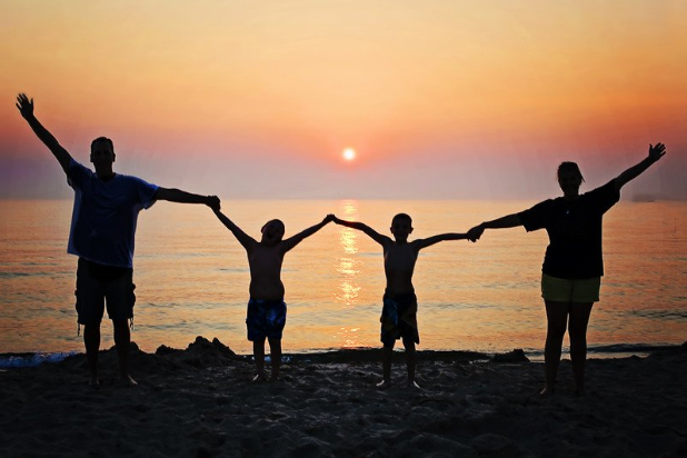 family watching sunset